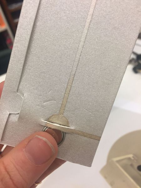 Dab of ink on the underside