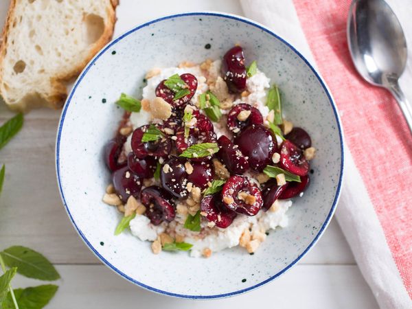 Sweet-Sour Macerated Cherries With Marcona Almonds, Mint, and Ricotta