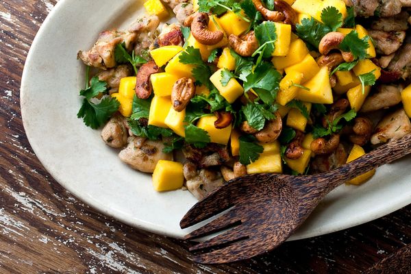 Black Pepper Chicken Thighs With Mango, Rum and Cashews Recipe - NYT Cooking