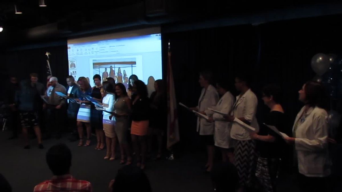 Students Are Pinned - Receive Hugs - C