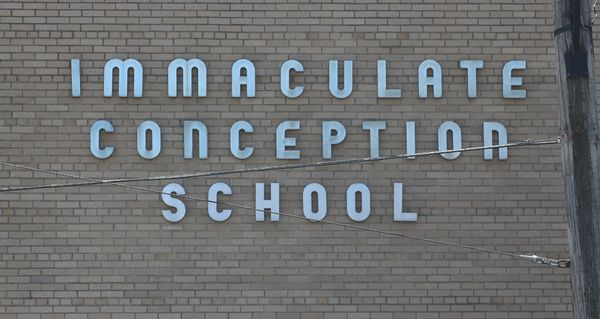Signage on the front of Immaculate Conception School (1950). Photograph by Paul Shaw (2016).