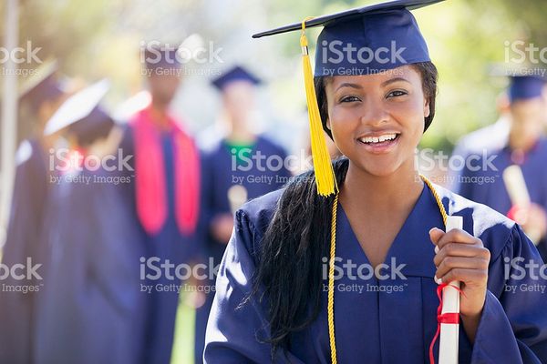 Smiling Graduate Holding Diploma stock photo 143071566 | iStock