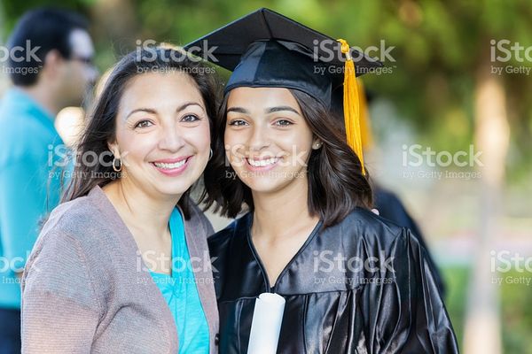 Proud Mom With College Graduate stock photo 613884664 | iStock