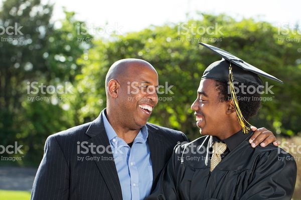 African American Father And Son On Graduation Day stock photo 525361978 | iStock