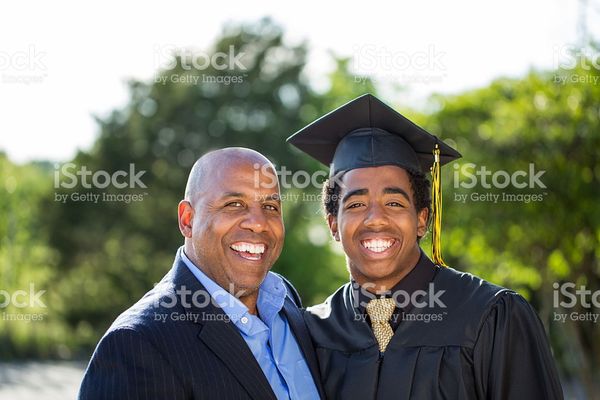 African American Father And Son On Graduation Day stock photo 525362116 | iStock