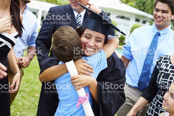 Hispanic Student And Family Celebrating Graduation stock photo 496647221 | iStock