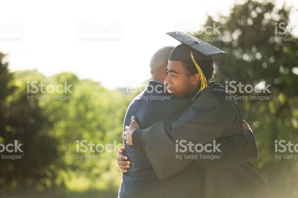 African American Father And Son On Graduation Day stock photo 525364242 | iStock