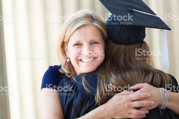 Happy Mother Congratulating Hugging Daughter In University Graduation Ceremony stock photo 53507582…
