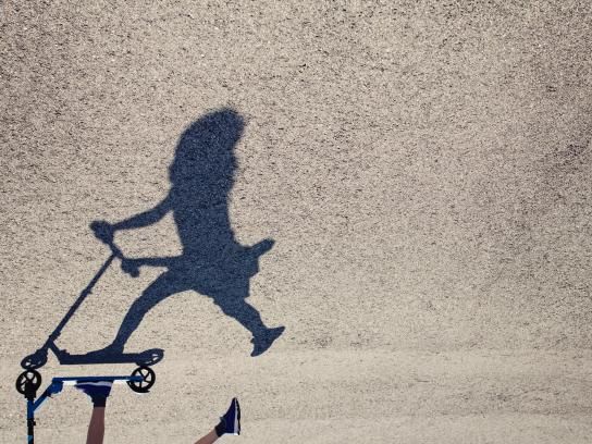Riding a scooter with her shadow | Ads of the World™