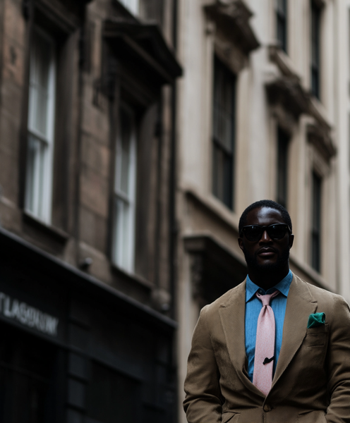 arsenbenda_Photo_of_a_man_in_new_york_wearing_a_khaki_blazer__7297eb85-37f6-408d