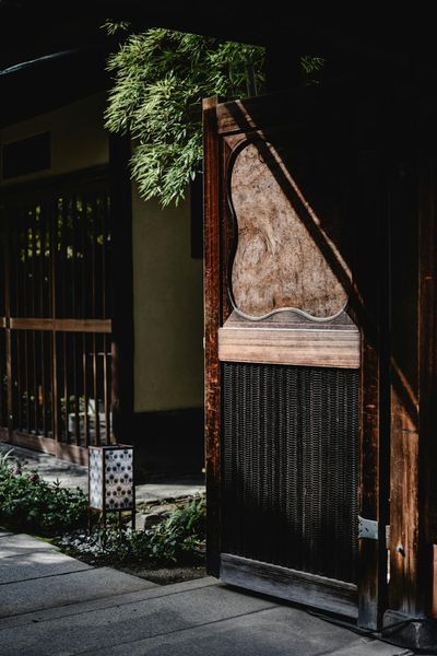 Natural Light on a Brown Wooden Door · Free Stock Photo