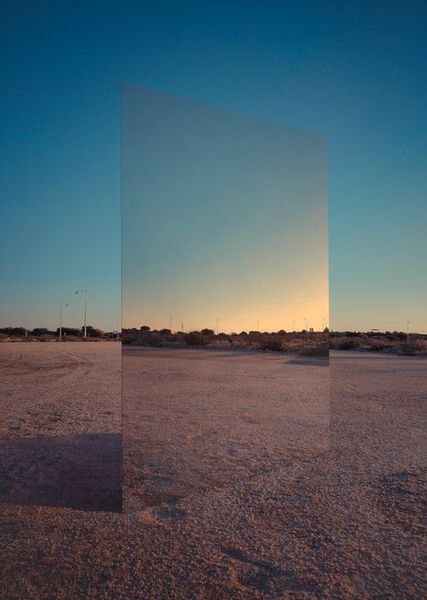 photojojo:  Amazing things can happen when you have a huge mirror to spice up your landscape photos…