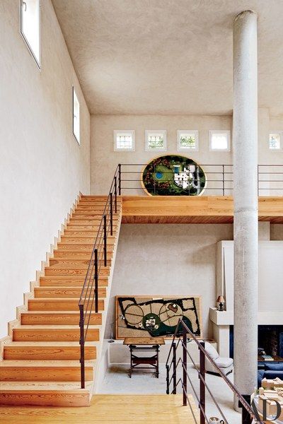 Spanishpine stairs grace the doubleheight reception room which is dotted with scale models of Ferna…