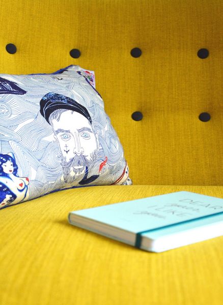 blue book on yellow chair