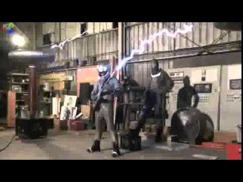 ArcAttack performs a Tesla Coil version of Iron Man by Black Sabbath with a Faraday Guitar