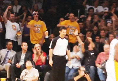 Lakers-Fan-Takes-Off-Sunglasses