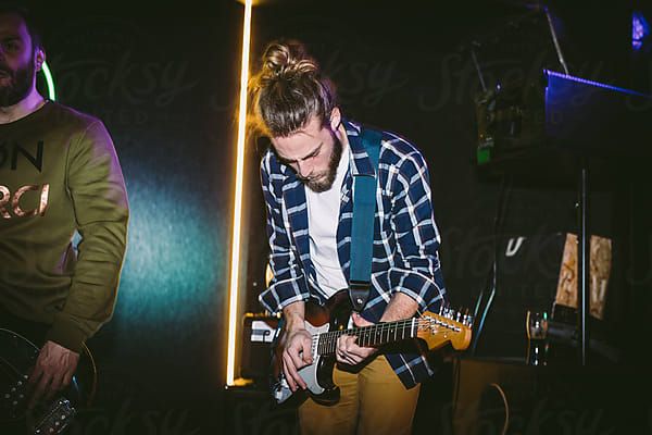 Rock and Roll Band on Stage by Luminafor Stocksy United