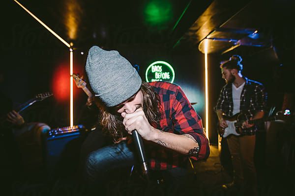 Frontman Singing on The Stage by Luminafor Stocksy United