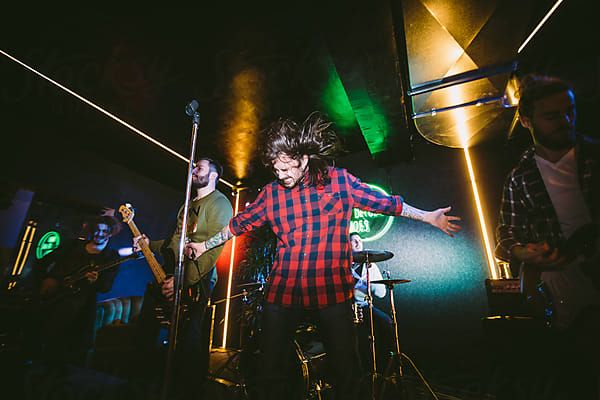 Punk Band Performing by Luminafor Stocksy United