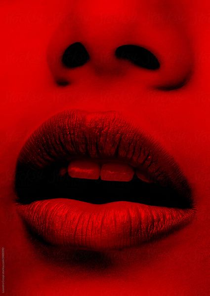 Closeup mouth beauty shot on red