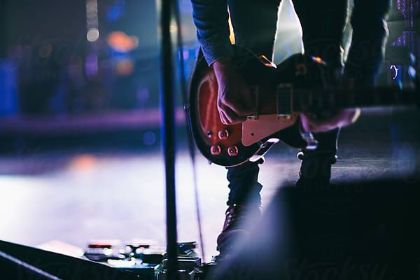 Guitar player at live concert by Christian Gideonfor Stocksy United