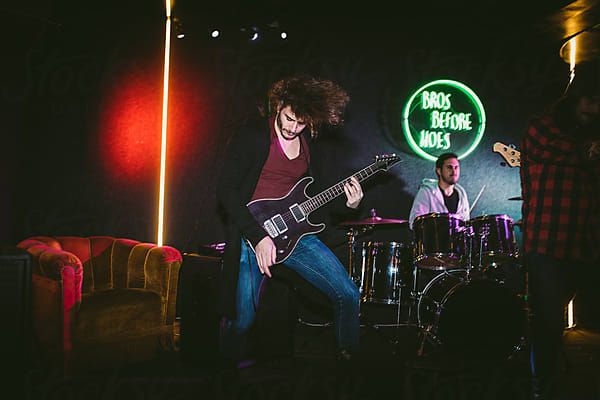 Rock and Roll Band on Stage by Luminafor Stocksy United