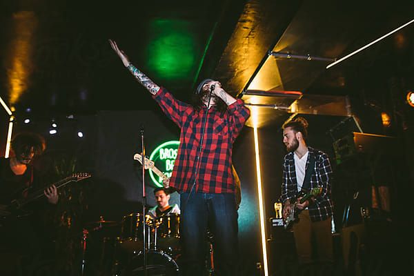 Rock and Roll Band on Stage by Luminafor Stocksy United