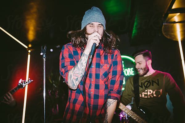 Rock and Roll Band on Stage by Luminafor Stocksy United