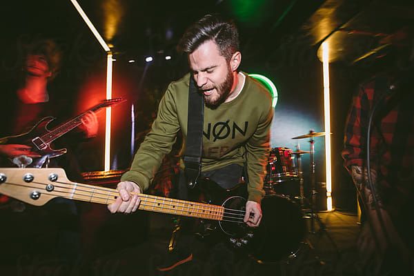 Guitarist on Stage by Luminafor Stocksy United