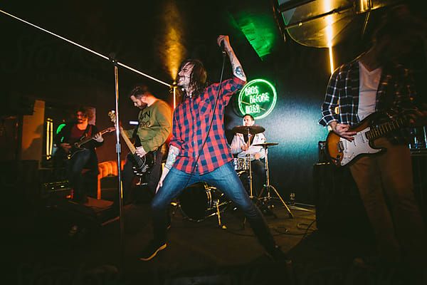 Punk Band Performing by Luminafor Stocksy United