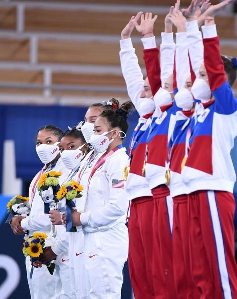 Team USA watch RUS celebrate Gold