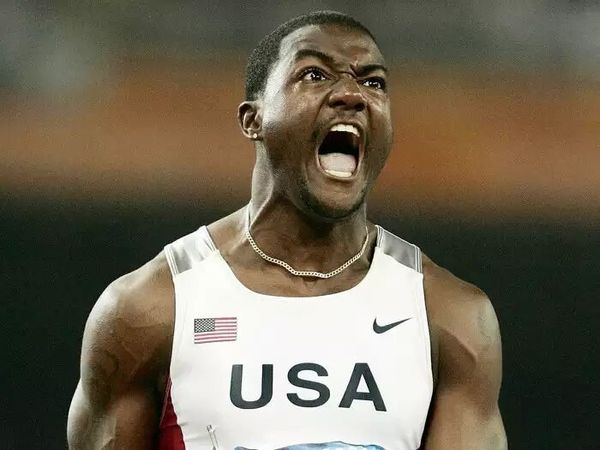justin-gatlin-celebrates-his-victory-in-the-100-meters-final-at-the-2004-athen