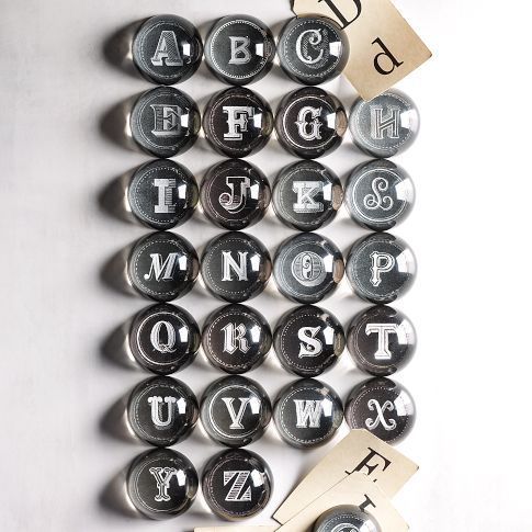 $8 Dana Tanamachi is blowing it up. West Elm alphabet paperweights with her chalk handiwork.