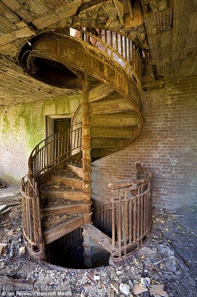 Stairwells strewn with debris and walls crumbling slowly to dust, it is the island that New York fo…