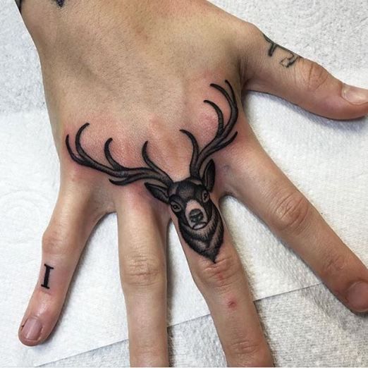 Great placement. | Inked Magazine - Tags: black & white, deer, elk, hand, knuckle
