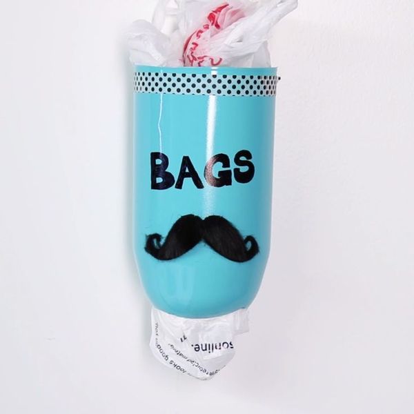 Turn A Two-Liter Bottle Into A Pretty Garbage Bag Dispenser