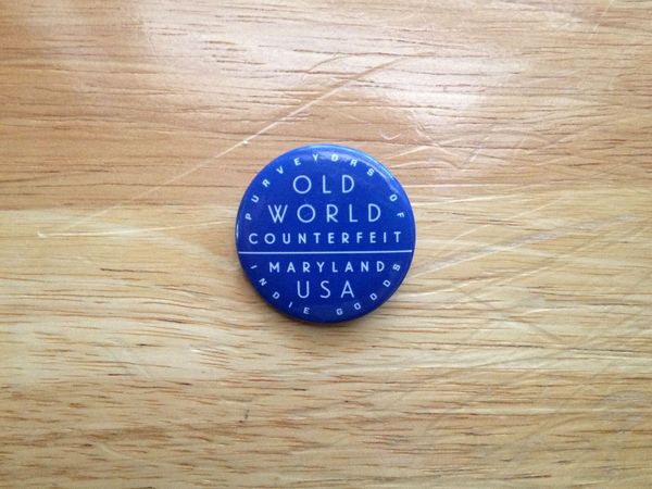 old_world_counterfeit_pin