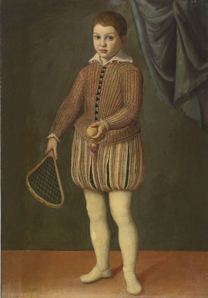 portrait-of-a-boy-holding-a-tennis-racket-and-ball-between-1558-and-picture-id599974637