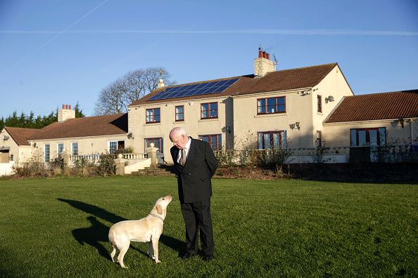 News Photo : John Elliott, founder of Ebac Ltd., poses for a...
