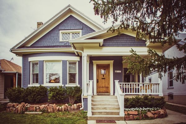 Love this vintage home! Just look how cute that little front porch is!