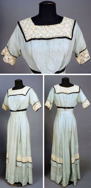 Summer dress, circa 1915. Blue slubbed silk trimmed with lace and black satin bands. Via Whitaker A…