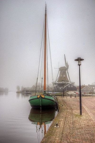 Boat and Windmill on a Misty Day Friesland Netherlands Photography by klaash63