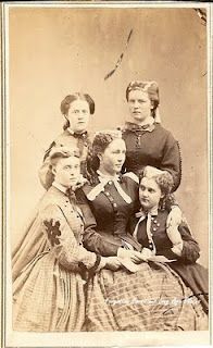 "mother and daughters"--- are we sure this isn't 5 sisters? Why do we always assume one is the moth…