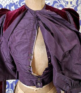 Very late 1890's Purple Bodice - pigeon front plastron lifted up showing the center front button an…