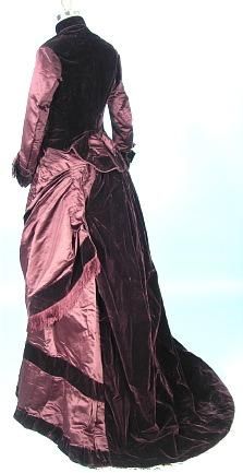 This is an eggplant colored bustle gown in almost perfect condition from someone's attic. So incred…