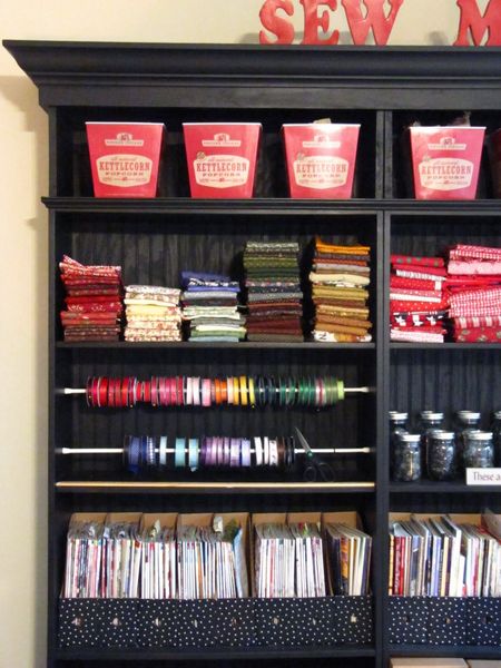 craft storage. love the tension rod for ribbons!