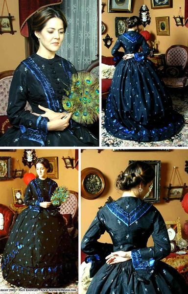 Day dress ca. 1860s. Black silk with silver and blue embroidery. Trimmed with blue silk and black l…