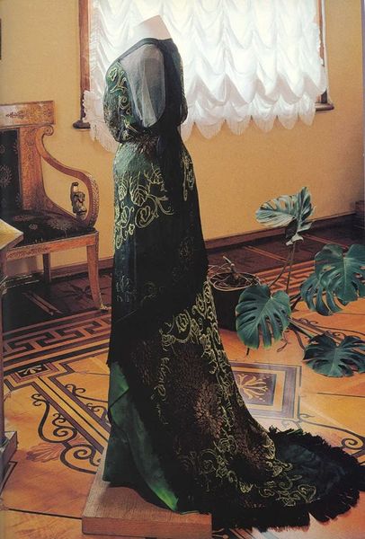 Embroidered green satin and black chiffon evening gown with fringe trim, designed by Nadezhda "Hope…