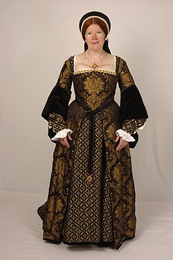 1540s costume made for JMD at Hampton Court Palace. Gown of black/gold silk damask with large turnb…