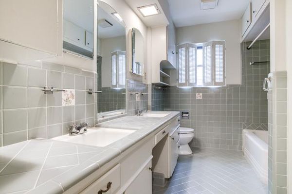 Original 60s grey and white bathroom. Property Images for 6338 Town Hill Lane, Dallas Texas - MLS: …
